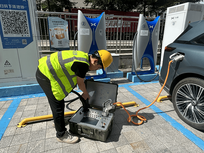Engineers conducting an EV charger system field test